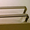 Custom door pulls for Urban Outfitters (Upper West Side, NYC), aluminum mill finish