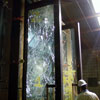 Hurricane-resistant glass doors after a successful missile impact test.